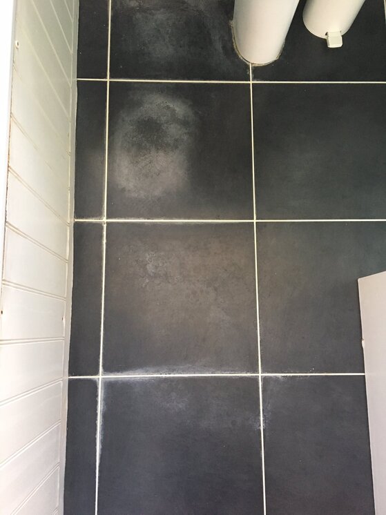 How to Clean Black Tile Shower Floor?